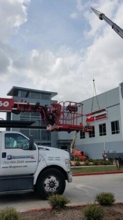 Houston sign companies - sign installation on building