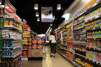 supermarket interior with Houston custom signs for advertisement