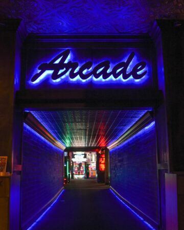 Houston channel letter signs with blue backlight for arcade