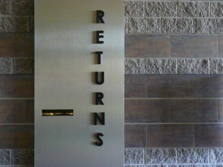 informational Houston wall signs for retail returns